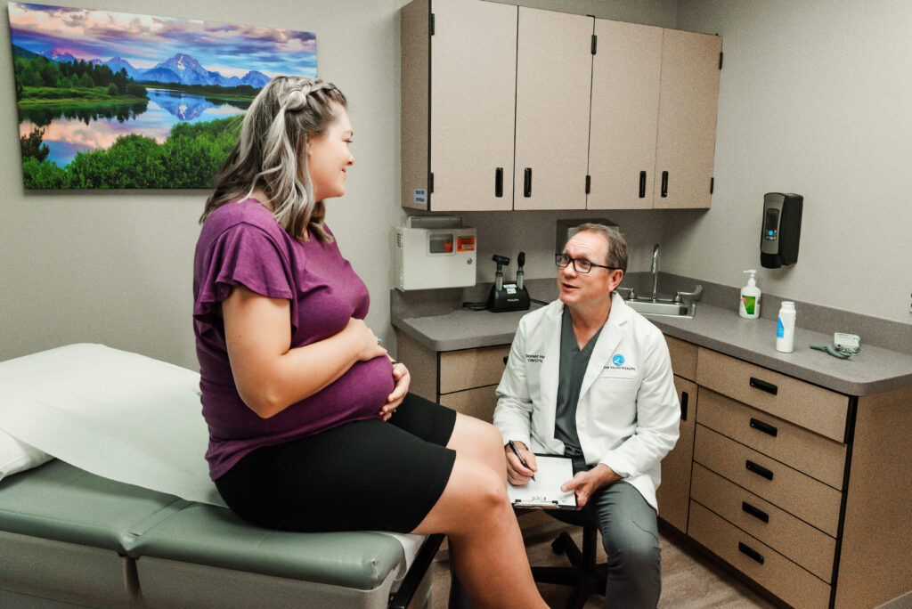 Dr.Howser-OGGYN-with-prenatal-patient 